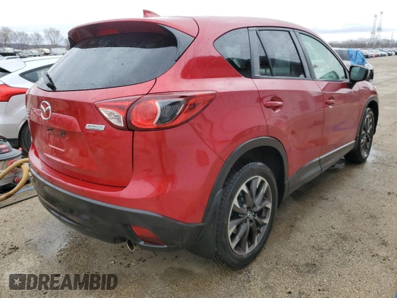 2016 Mazda CX-5 Grand Touring with VIN JM3KE4DY9G0771088, listed as a Copart auction lot 50615495 with 93,221 mi miles and Salvage Title. Bid and sale history available at DreamBid. Image 3.