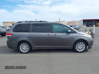 2011 Toyota Sienna XLE AAS with VIN 5TDYK3DC3BS059501, listed as a IAAI auction lot 42185225 with 143,416 mi miles. Bid and sale history available at carsss.com. Image 13.