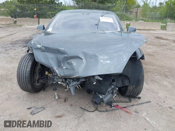 2013 Tesla Model S with VIN 5YJSA1CG9DFP27357, listed as a IAAI auction lot 42362514 with Not provided miles and . Bid and sale history available at DreamBid. Image 6.