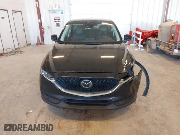 2018 Mazda CX-5 Touring with VIN JM3KFBCM9J0437490, listed as a IAAI auction lot 42006998 with 176,959 mi miles. Bid and sale history available at carsss.com. Image 12.