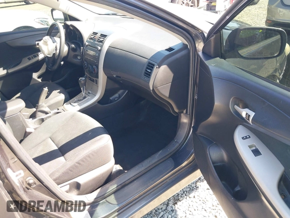 2010 Toyota Corolla with VIN 1NXBU4EE2AZ171959, listed as a IAAI auction lot 42075409 with 190,019 mi miles and . Bid and sale history available at DreamBid. Image 5.