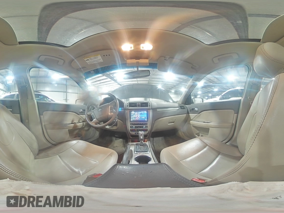 2012 Ford Fusion Hybrid с VIN 3FADP0L33CR231536, выставлен на аукционе Copart как лот 55330545 с пробегом 165 481 миль миль и Списание • Salvage title. История ставок и продаж доступна на DreamBid. Изображение 14.