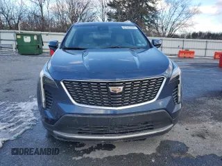 2021 Cadillac XT4 AWD Premium Luxury with VIN 1GYFZDR4XMF007080, listed as a Copart auction lot 87943335 with 36,379 mi miles and Salvage Title. Bid and sale history available at carsss.com. Image 5.