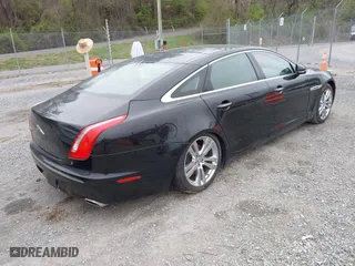 2012 Jaguar XJ with VIN SAJWA2GBXCLV32998, listed as a IAAI auction lot 41954979 with 1 mi miles. Bid and sale history available at carsss.com. Image 4.