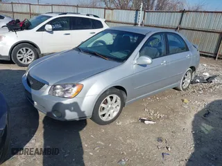 2006 Kia Spectra EX with VIN KNAFE121065372261, listed as a IAAI auction lot 41707311 with 237,555 mi miles. Bid and sale history available at carsss.com. Image 2.