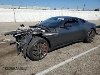 2018 Aston Martin DB11 z VIN SCFRMFAV1JGL05008, wystawiony jako Copart lot #77024394 z przebiegiem Nie podano mil oraz Szkody całkowita. Historia ofert i sprzedaży dostępna na DreamBid. Obrazek 1.
