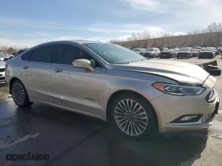 2018 Ford Fusion Hybrid Titanium with VIN 3FA6P0RUXJR234049, listed as a Copart auction lot 48765505 with 106,027 mi miles and Salvage Title. Bid and sale history available at carsss.com. Image 4.
