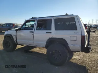 1996 Jeep Cherokee SE with VIN 1J4FJ28S0TL272778, listed as a Copart auction lot 83498634 with Not provided miles and Salvage title. Bid and sale history available at DreamBid. Image 2.