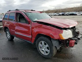 2010 Jeep Grand Cherokee Laredo with VIN 1J4RR4GT0AC123716, listed as a Copart auction lot 86388444 with 189,490 mi miles and Salvage Title. Bid and sale history available at carsss.com. Image 4.