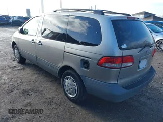 2003 Toyota Sienna CE with VIN 4T3ZF19C33U553315, listed as a IAAI auction lot 41212999 with 274,331 mi miles. Bid and sale history available at carsss.com. Image 3.