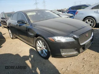 2018 Jaguar XF with VIN SAJBJ4FN4JCY55365, listed as a Copart auction lot 75350454 with 50,373 mi miles and Salvage Title. Bid and sale history available at DreamBid. Image 4.