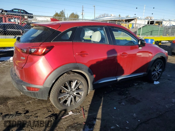 2018 Mazda CX-3 Grand Touring z VIN JM1DKFD75J0319224, wystawiony jako Copart lot #87504495 z przebiegiem 47 466 mil mil oraz Szkody całkowita. Historia ofert i sprzedaży dostępna na DreamBid. Obrazek 3.