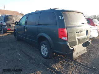 2011 Dodge Grand Caravan Express with VIN 2D4RN4DG9BR719279, listed as a IAAI auction lot 41648483 with 999,999 mi miles. Bid and sale history available at carsss.com. Image 3.