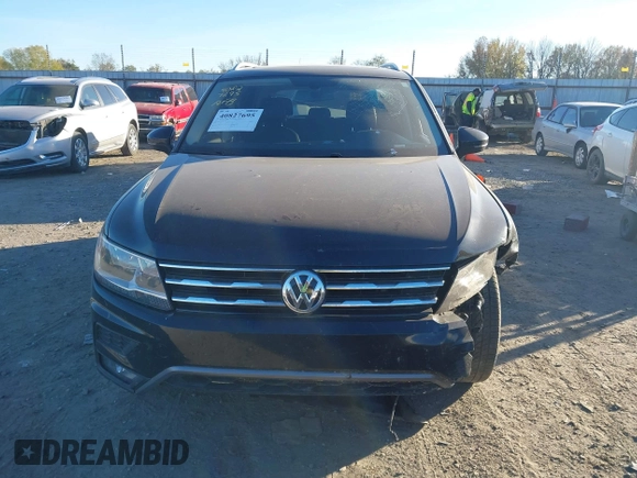 2018 Volkswagen Tiguan SEL with VIN 3VV3B7AX7JM117053, listed as a IAAI auction lot 40827695 with 71,489 mi miles and . Bid and sale history available at DreamBid. Image 12.