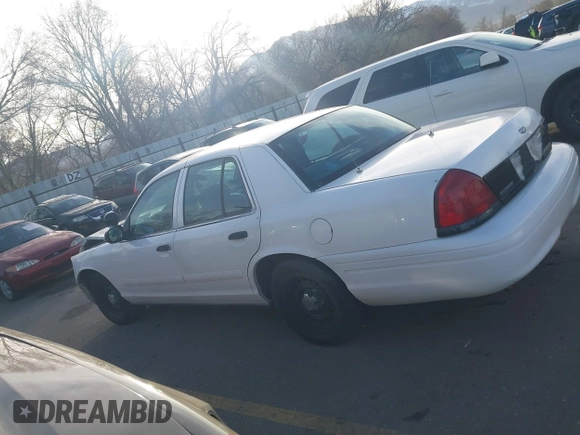 2000 Ford Crown Victoria Police Interceptor z VIN 2FAFP71W9YX149303, wystawiony jako IAAI lot #41888402 z przebiegiem 148 081 mil mil oraz . Historia ofert i sprzedaży dostępna na DreamBid. Obrazek 14.