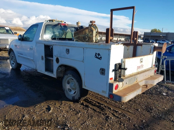 2002 Ford F-150 XL with VIN 1FTRF17242NB49973, listed as a IAAI auction lot 40825610 with Not Provided miles. Bid and sale history available at carsss.com. Image 3.