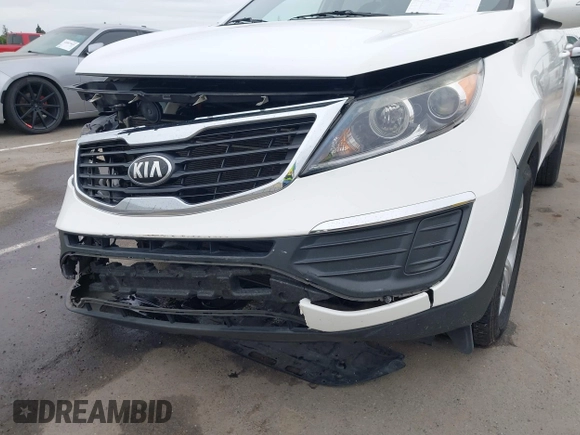 2013 Kia Sportage LX with VIN KNDPBCA21D7356092, listed as a IAAI auction lot 42111086 with 102,521 mi miles and . Bid and sale history available at carsss.com. Image 17.