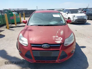 2012 Ford Focus SE z VIN 1FAHP3F21CL428659, wystawiony jako IAAI lot #42040183 z przebiegiem 195 947 mil mil oraz . Historia ofert i sprzedaży dostępna na DreamBid. Obrazek 6.