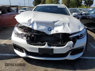 2018 BMW 7 Series 740i with VIN WBA7E2C5XJB214886, listed as a Copart auction lot 57833143 with 39,975 mi miles. Bid and sale history available at carsss.com. Image 5.