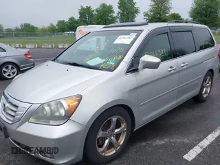 2009 Honda Odyssey Touring with VIN 5FNRL38859B029714, listed as a IAAI auction lot 42266381 with 196,747 mi miles and . Bid and sale history available at DreamBid. Image 12.