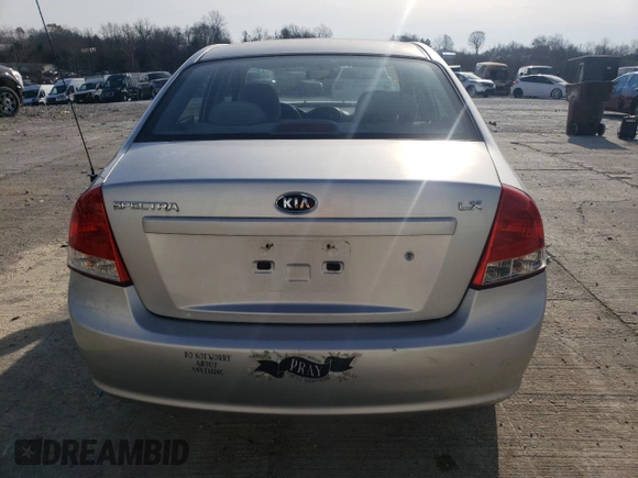2009 Kia Spectra LX with VIN KNAFE221895659552, listed as a Copart auction lot 82555924 with 114,704 mi miles and Salvage Title. Bid and sale history available at carsss.com. Image 6.