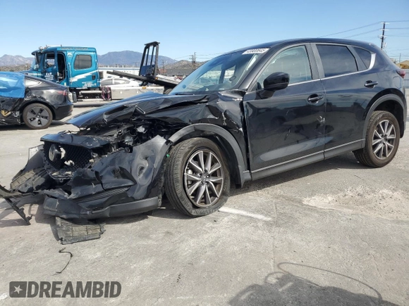 2018 Mazda CX-5 Touring z VIN JM3KFBCM4J0444167, wystawiony jako Copart lot #45900645 z przebiegiem 85 881 mil mil oraz Czysty tytuł • Clean title. Historia ofert i sprzedaży dostępna na DreamBid. Obrazek 1.