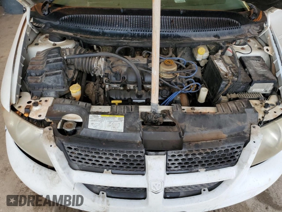 2003 Dodge Caravan Sport with VIN 2D4GP44L73R101409, listed as a Copart auction lot 51632205 with 242,567 mi miles and Salvage Title. Bid and sale history available at DreamBid. Image 12.