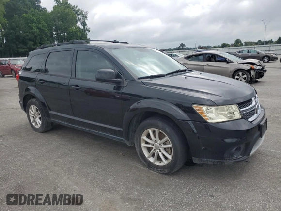 2015 Dodge Journey SXT with VIN 3C4PDCBG9FT690969, listed as a Copart auction lot 63434185 with 108,118 mi miles and Clean title. Bid and sale history available at DreamBid. Image 4.