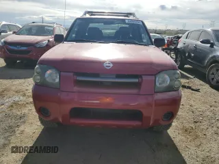 2003 Nissan Frontier XE with VIN 1N6ED27T13C409632, listed as a Copart auction lot 84884434 with 194,167 mi miles and Salvage title. Bid and sale history available at DreamBid. Image 5.