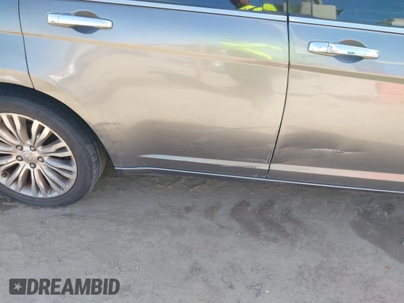 2012 Chrysler 200 Limited with VIN 1C3CCBCG3CN306615, listed as a IAAI auction lot 41736789 with 175,325 mi miles and . Bid and sale history available at DreamBid. Image 13.