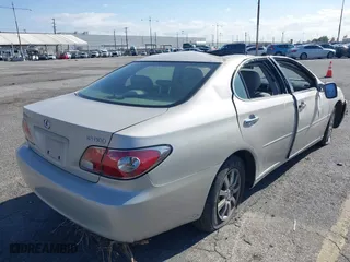 2004 Lexus ES 330 with VIN JTHBA30G240010487, listed as a IAAI auction lot 41627116 with 148,748 mi miles. Bid and sale history available at carsss.com. Image 4.