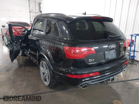 2015 Audi Q7 3.0L TDI Prestige with VIN WA1WMAFE5FD016231, listed as a IAAI auction lot 41221219 with 108,632 mi miles. Bid and sale history available at carsss.com. Image 3.