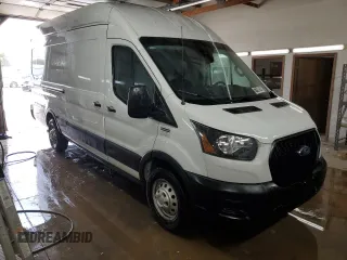 2023 Ford Transit Cargo with VIN 1FTBR3U89PKA70899, listed as a Copart auction lot 77940504 with 62,196 mi miles and Clean Title. Bid and sale history available at DreamBid. Image 4.