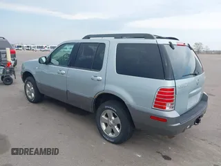 2005 Mercury Mountaineer Convenience z VIN 4M2ZU86K65UJ10015, wystawiony jako IAAI lot #42063970 z przebiegiem 153 542 mil mil oraz . Historia ofert i sprzedaży dostępna na DreamBid. Obrazek 3.