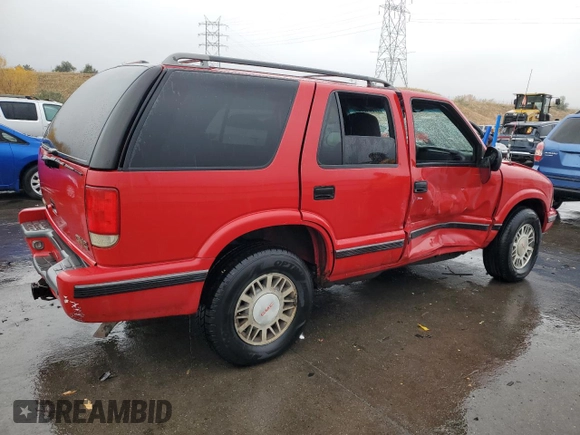 1998 GMC Jimmy SLE with VIN 1GKDT13W1W2508350, listed as a Copart auction lot 77904394 with 175,000 mi miles and Salvage Title. Bid and sale history available at carsss.com. Image 3.
