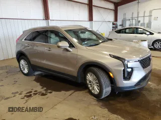 2024 Cadillac XT4 AWD Luxury with VIN 1GYFZBR48RF242850, listed as a Copart auction lot 52290865 with 1,524 mi miles and Salvage Title. Bid and sale history available at carsss.com. Image 4.