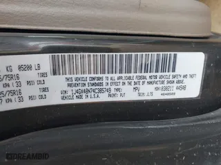 2004 Jeep Grand Cherokee Laredo with VIN 1J4GX48N74C385749, listed as a IAAI auction lot 41877421 with 141,255 mi miles. Bid and sale history available at carsss.com. Image 9.