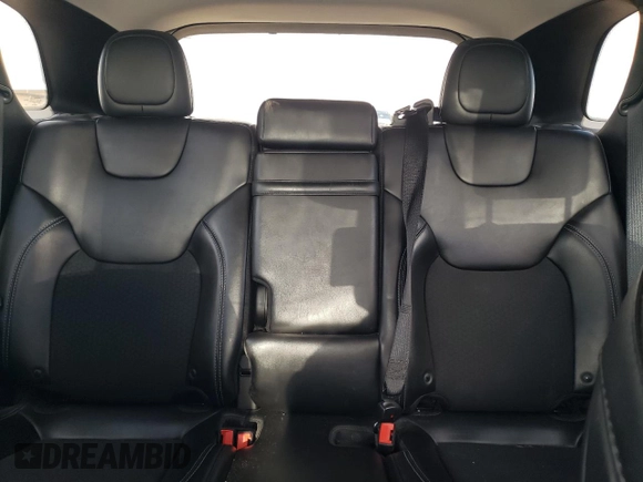 2019 Jeep Cherokee Latitude Plus z VIN 1C4PJMLX5KD331230, wystawiony jako Copart lot #56029515 z przebiegiem 84 912 mil mil oraz Szkoda całkowita • Salvage title. Historia ofert i sprzedaży dostępna na DreamBid. Obrazek 10.
