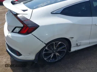 2018 Honda Civic Si z VIN 2HGFC3A54JH755941, wystawiony jako IAAI lot #42269677 z przebiegiem 99 627 mil mil oraz . Historia ofert i sprzedaży dostępna na DreamBid. Obrazek 6.