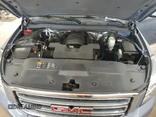 2015 GMC Yukon SLT z VIN 1GKS2BKC0FR630731, wystawiony jako Copart lot #55359445 z przebiegiem Nie podano mil oraz Szkoda całkowita • Salvage title. Historia ofert i sprzedaży dostępna na DreamBid. Obrazek 12.