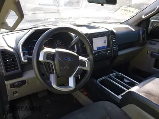 2019 Ford F-150 XL with VIN 1FTEW1EP4KKD73243, listed as a IAAI auction lot 41456076 with 114,198 mi miles. Bid and sale history available at carsss.com. Image 20.