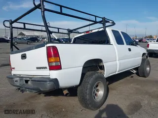 2002 GMC Sierra 1500 SLE with VIN 2GTEC19V221181711, listed as a IAAI auction lot 41571536 with 162,296 mi miles. Bid and sale history available at carsss.com. Image 4.