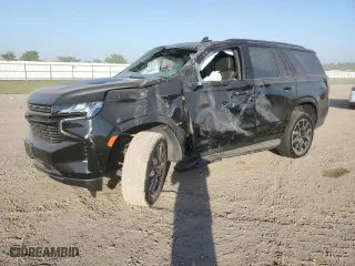 2024 Chevrolet Tahoe RST with VIN 1GNSKRKD5RR260708, listed as a Copart auction lot 74101214 with 5,609 mi miles and Salvage Title. Bid and sale history available at carsss.com. Image 1.