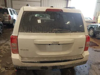 2014 Jeep Patriot Latitude with VIN 1C4NJRFB4ED864114, listed as a IAAI auction lot 41639732 with 103,119 mi miles. Bid and sale history available at carsss.com. Image 16.
