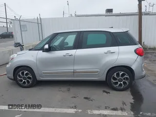 2014 FIAT 500L Lounge z VIN ZFBCFACH8EZ005035, wystawiony jako IAAI lot #41824368 z przebiegiem 80 914 mil mil oraz . Historia ofert i sprzedaży dostępna na DreamBid. Obrazek 14.