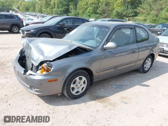 2003 Hyundai Accent GL z VIN KMHCG35CX3U243322, wystawiony jako IAAI lot #42277841 z przebiegiem 45 855 mil mil oraz . Historia ofert i sprzedaży dostępna na DreamBid. Obrazek 2.