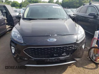 2020 Ford Escape Titanium z VIN 1FMCU9J97LUB25055, wystawiony jako Copart lot #60326945 z przebiegiem 78 711 mil mil oraz Szkoda całkowita • Salvage title. Historia ofert i sprzedaży dostępna na DreamBid. Obrazek 5.