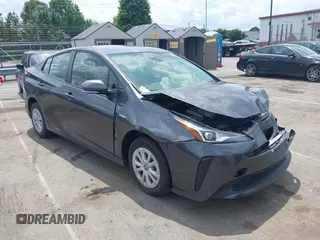 2021 Toyota Prius L Eco with VIN JTDKAMFU3M3152785, listed as a IAAI auction lot 42501351 with 60,489 mi miles and . Bid and sale history available at DreamBid. Image 1.