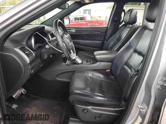 2018 Jeep Grand Cherokee High Altitude with VIN 1C4RJFCT8JC344110, listed as a Copart auction lot 60257065 with 94,917 mi miles and Salvage title. Bid and sale history available at DreamBid. Image 7.