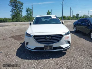 2016 Mazda CX-9 Grand Touring with VIN JM3TCBDY7G0125708, listed as a IAAI auction lot 39891843 with 133,988 mi miles. Bid and sale history available at carsss.com. Image 12.